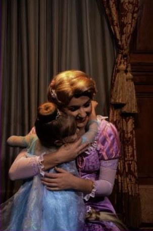 Child hugging a Disney princess character at Magic Kingdom — private VIP tour experience